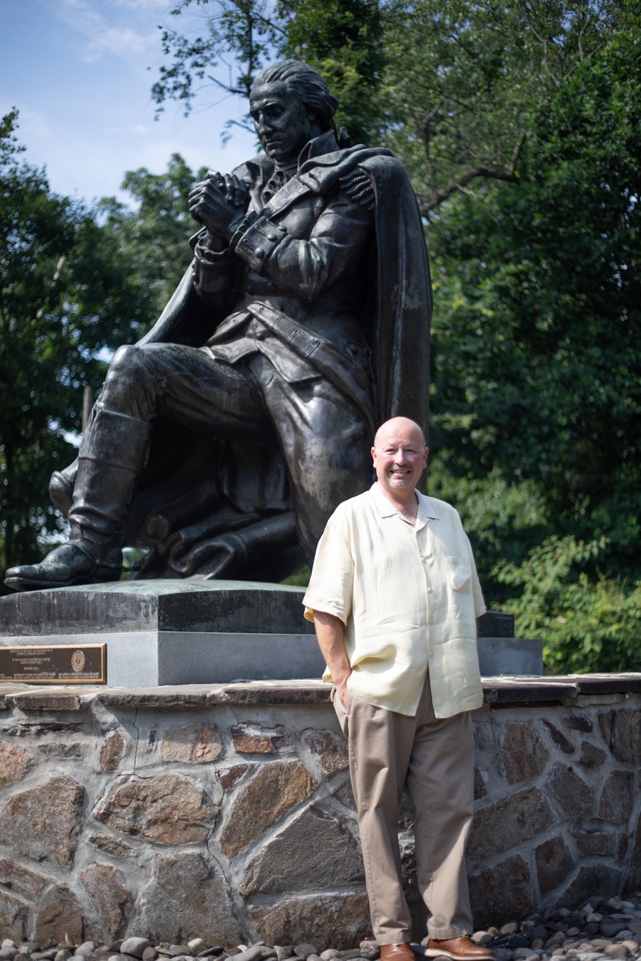 thumbnail_DU3A3293 Man standing in front of statue of Washington at Prayer