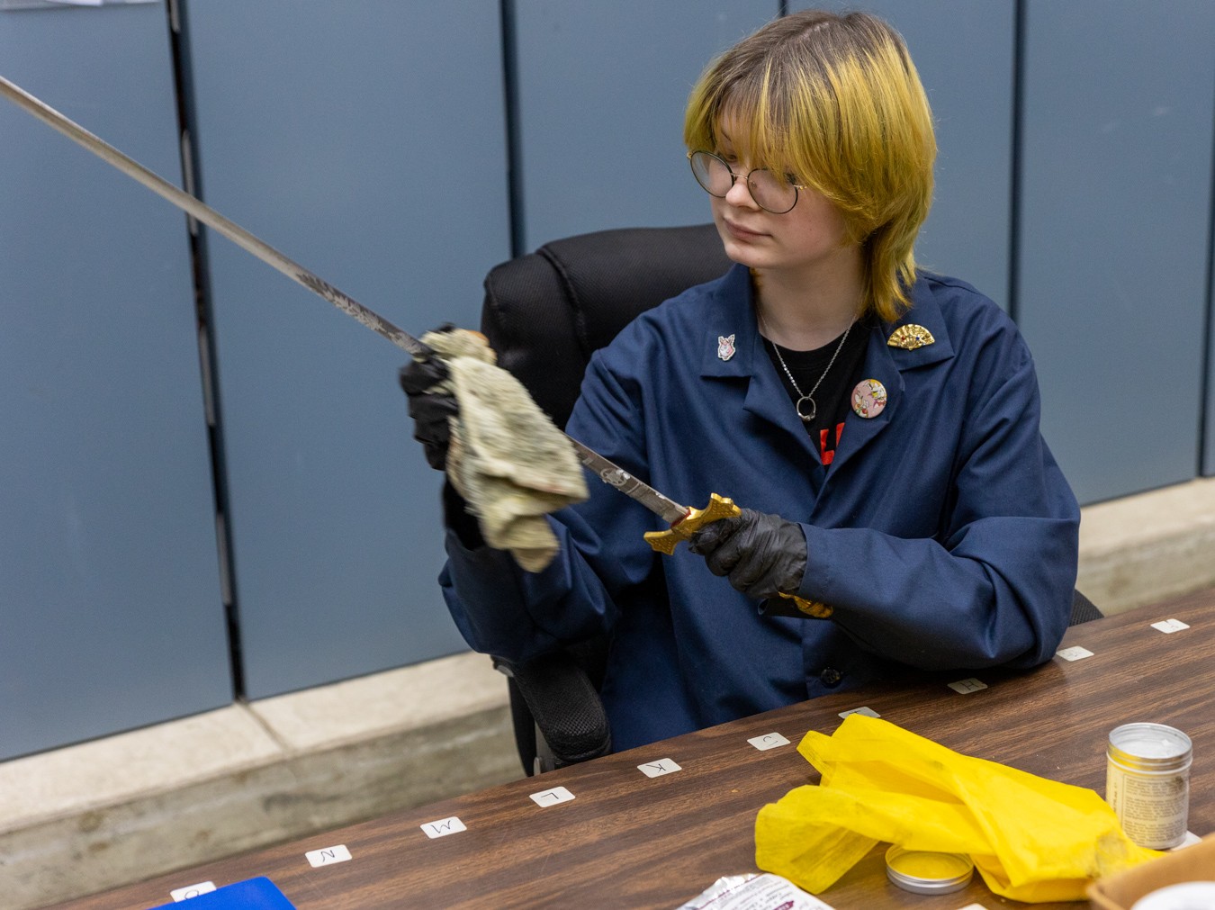 thumbnail_Drexel intern Young woman polishing sword